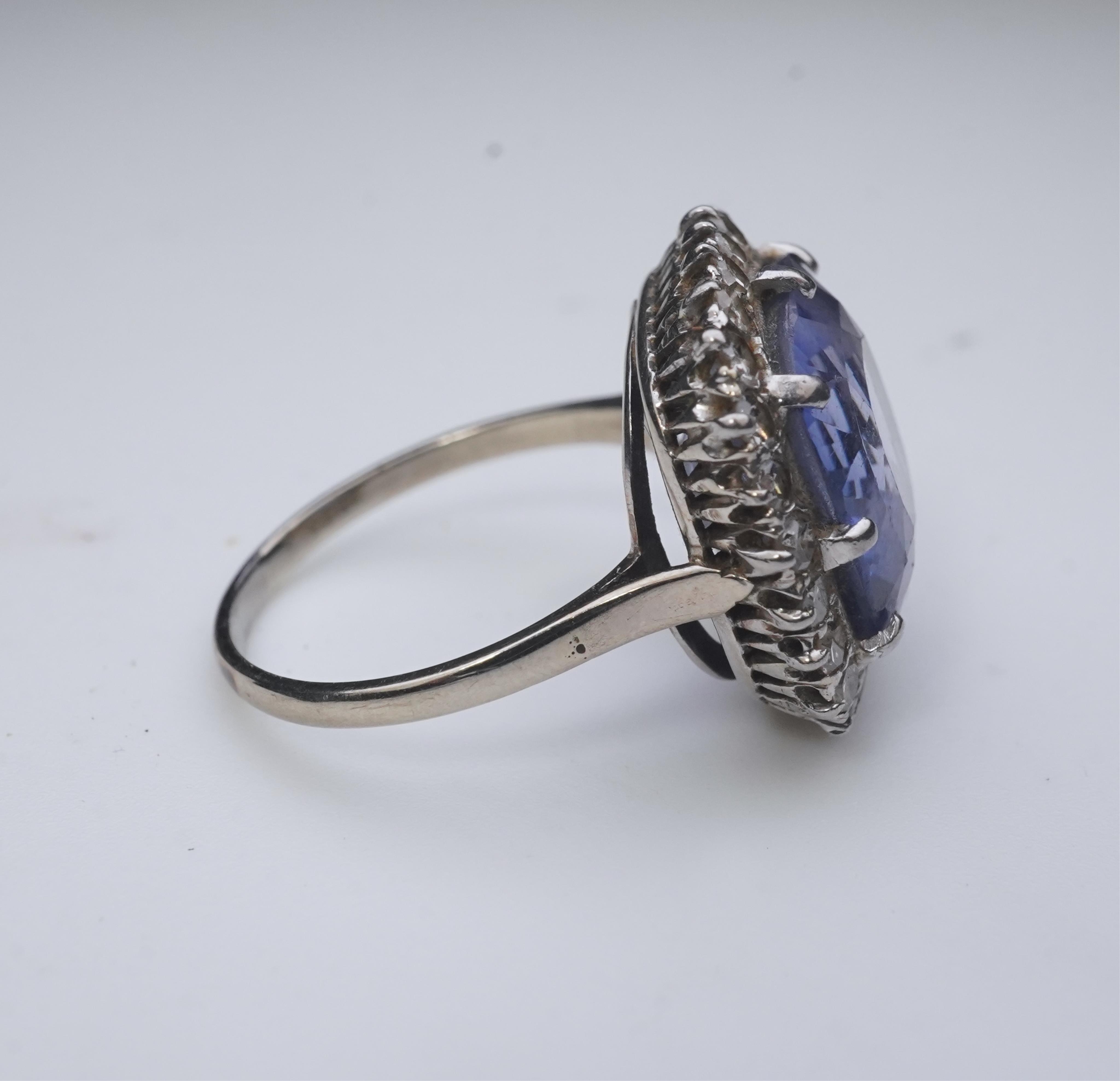 A synthetic sapphire and diamond cluster ring, early 20th century